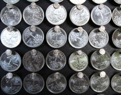 WEEPING JESUS DETAIL – 2006 - Guatemalan coins and stainless steel nails on four black stained boards  - 68” x 68” 